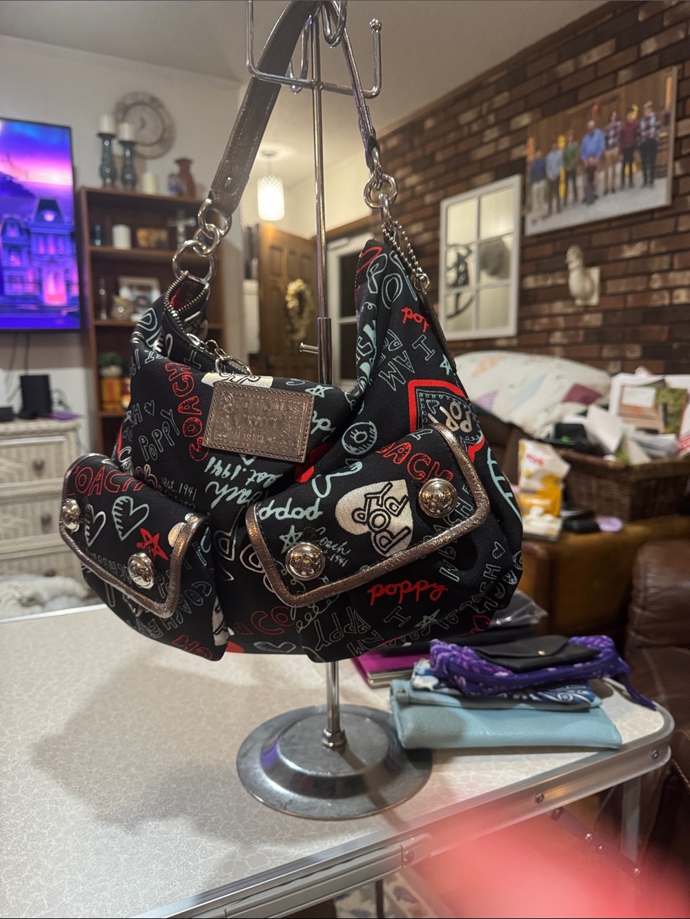 2010 Vintage Coach Black Shoulder Bag with Red, White, and Teal Graffiti Accents